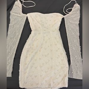 Oh Polly Milan (long sleeve embellished corset mini dress in ivory) SIZE: US 2
